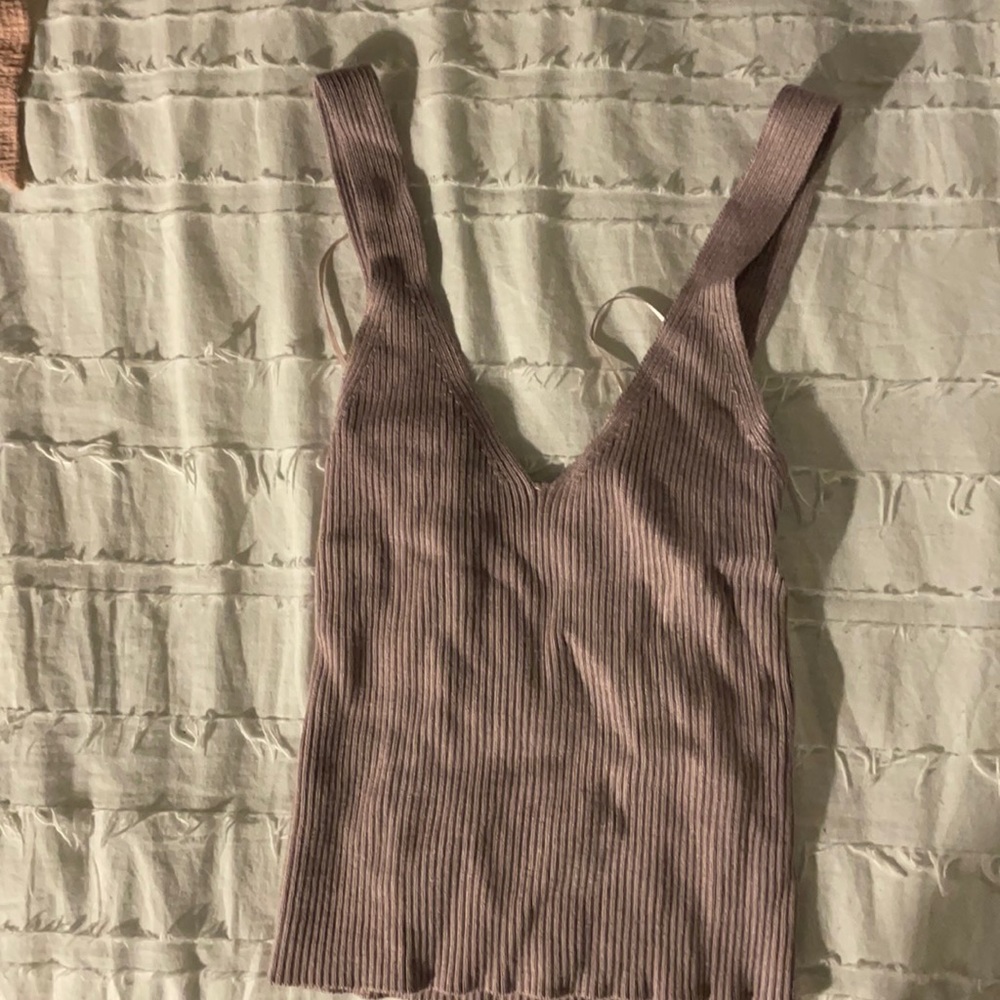 Debut sweat tank size M/L but runs very small more like a size S